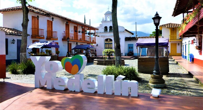 "I love medellin" sign and the little town paisa in the background